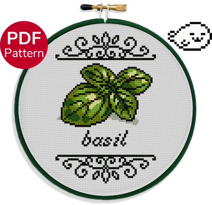 cross stitch pattern of a basil leaf with its name under it and ornate motifs around it