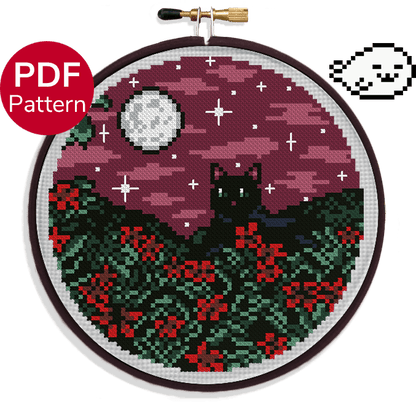 cross stitch pattern of black cat in a flower field under the full moon