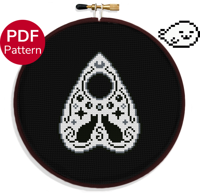 cross stitch pattern of a cat themed planchette