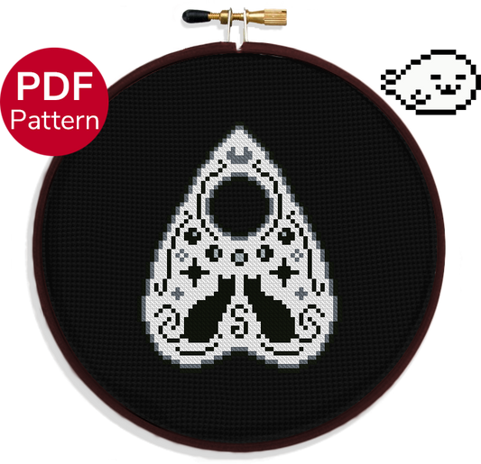 cross stitch pattern of a cat themed planchette