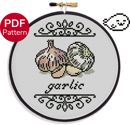 cross stitch pattern of garlic cloves with ornate decoration around it