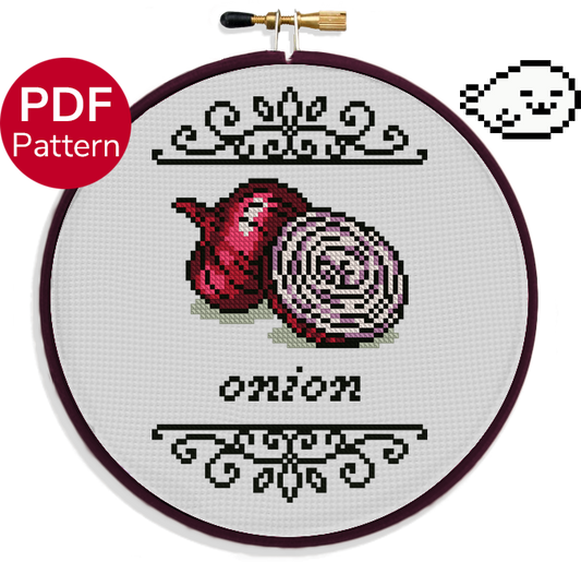 cross stitch pattern of two red onions, one chopped in half, with ornate decoration around it