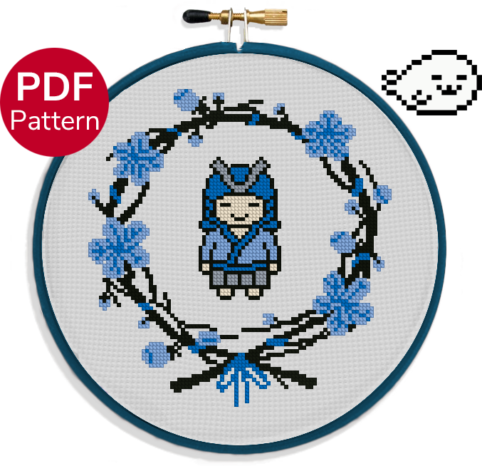 cross stitch pattern of a cute samurai dressed in blue and surrounded by a blue flower wreath