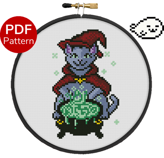 cross stitch pattern of a cat dressed as a witch caring for a cauldron